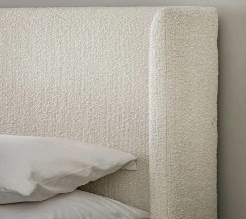 Letto imbottito Fairfax con spalliera a orecchioni